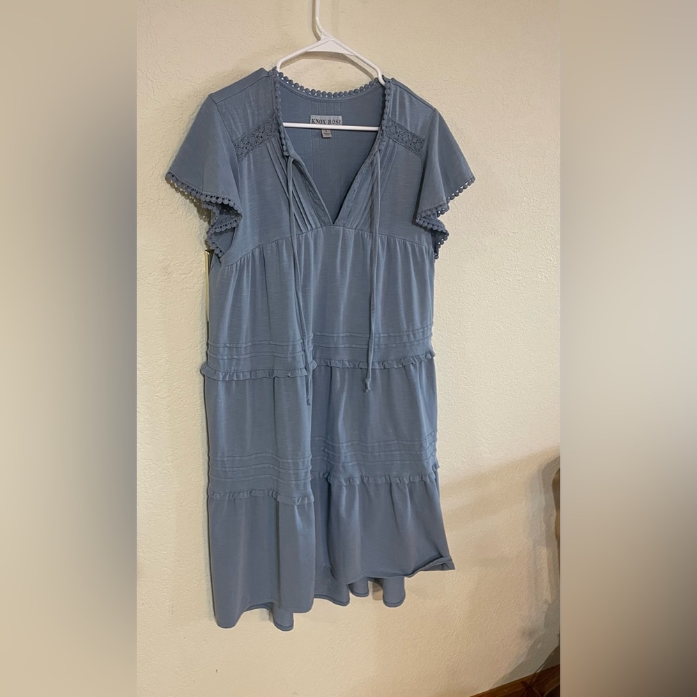 dusty blue dress with detail.Never worn but no tags.